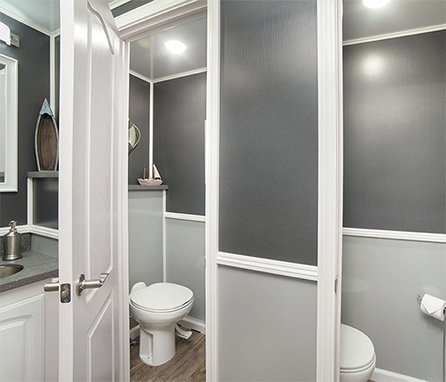 toilets inside luxury bathroom trailer